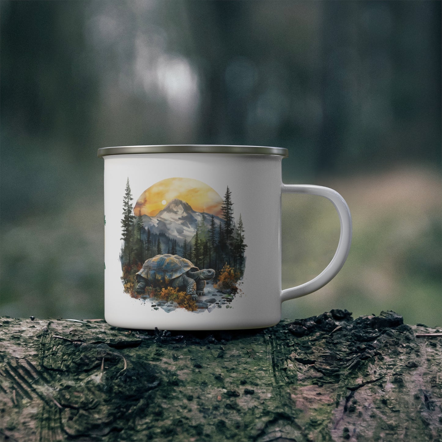Jade Turtle Mountain Turtle design enamelware mug sits on a horizontal tree in the forest.