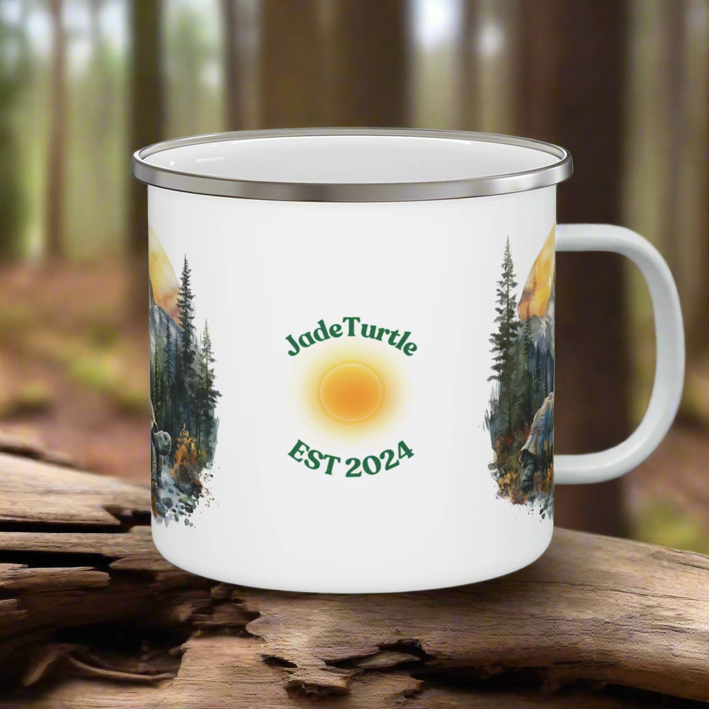Jade Turtle Mountain Turtle design enamelware mug sits on a piece of tree wood in the forest.