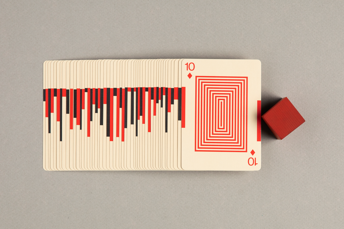 Flat lay view of playing cards fanned out to show how the edge design looks.